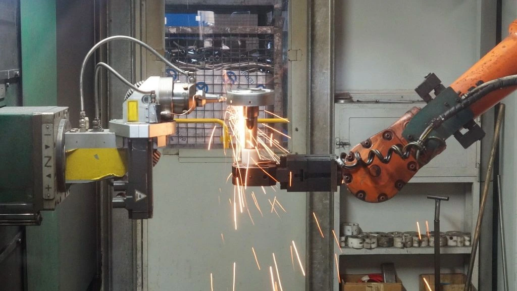 Robotic weld cell inside a John Deere agricultural equipment factory