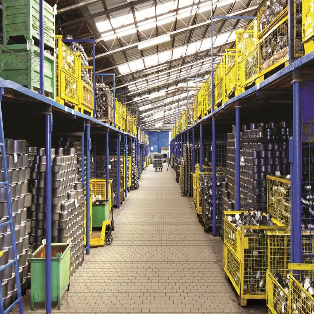 Automated storage and retrieval sortation aisle inside a parts warehouse